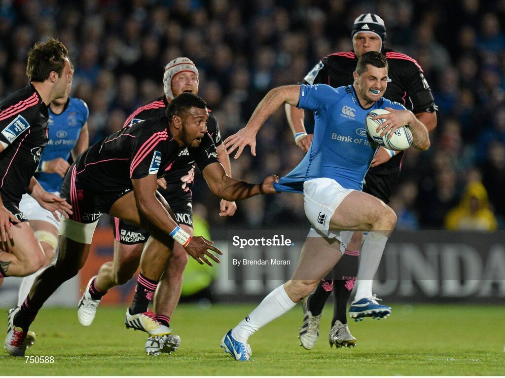 17 May 2013; Rob Kearney, Leinster, escapes the tackle of Waisea Nayacalevu, Stade Francais. Amlin Challenge Cup Final 2012/13, Leinster v Stade Francais, RDS, Ballsbridge, Dublin. Picture credit: Brendan Moran / SPORTSFILE
