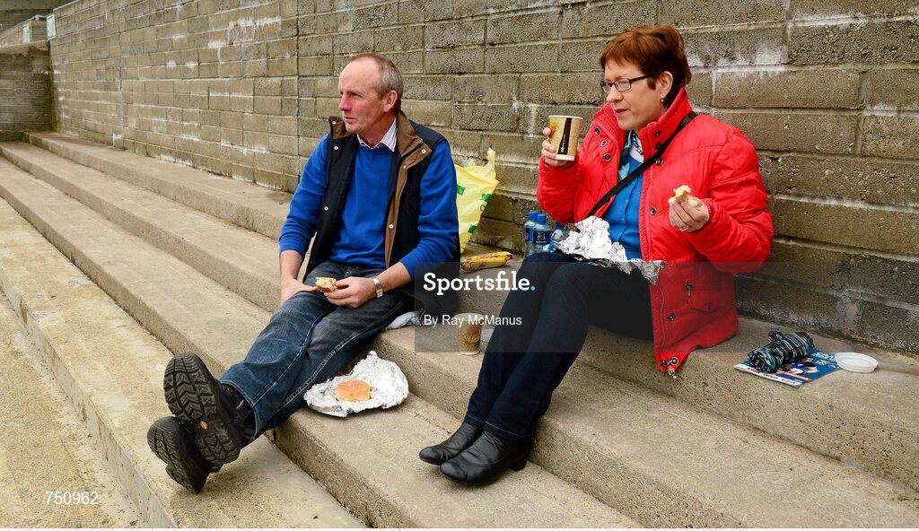 19 May 2013; Armagh supporter Michael McKenna, from Madden, Co. Armagh, and his wife Mary, a Tyrone supporter, enjoy a cup of tea and a sandwich before the game. Ulster GAA Football Senior Championship, Preliminary Round, Cavan v Armagh, Kingspan Breffni Park, Cavan. Picture credit: Ray McManus / SPORTSFILE