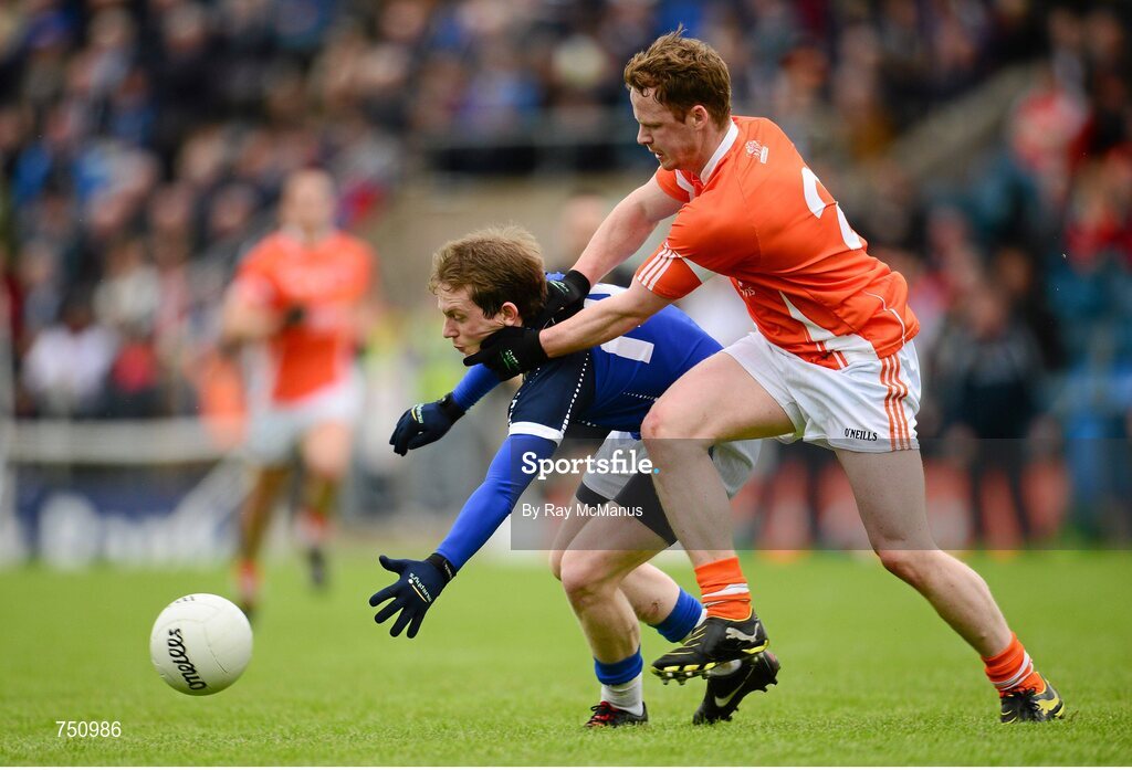 19 May 2013; Martin Dunne, Cavan, is tackled by Declan McKenna, Armagh. Ulster GAA Football Senior Championship, Preliminary Round, Cavan v Armagh, Kingspan Breffni Park, Cavan. Picture credit: Ray McManus / SPORTSFILE