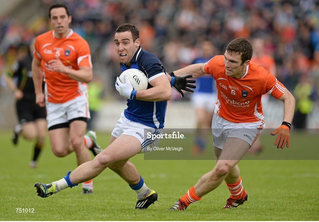 19 May 2013; Eugene Keating, Cavan, in action against Brendan Donaghy, Armagh. Ulster GAA Football Senior Championship, Preliminary Round, Cavan v Armagh, Kingspan Breffni Park, Cavan. Picture credit: Oliver McVeigh / SPORTSFILE
