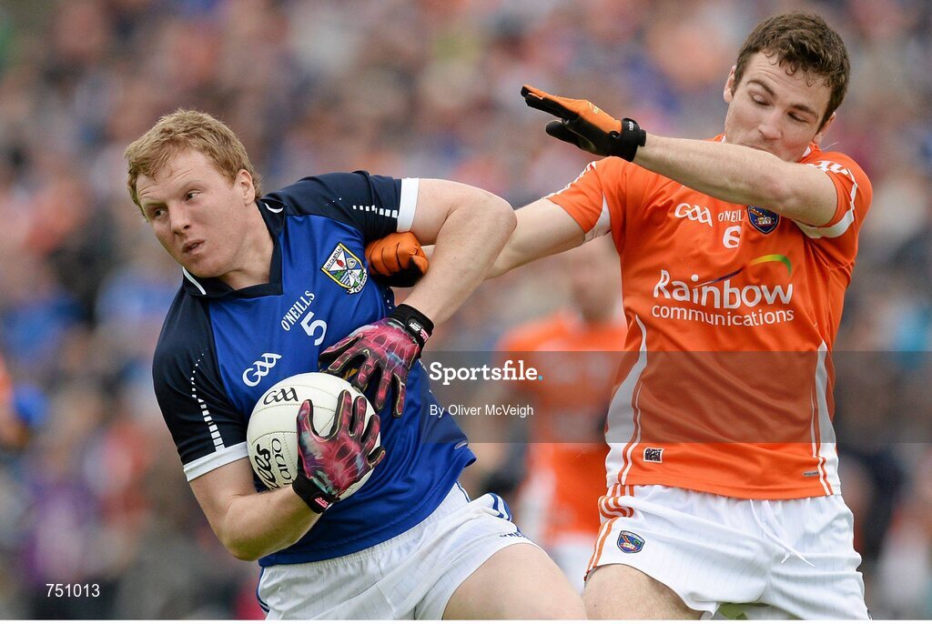 19 May 2013; James McEnroe, Cavan, in action against Brendan Donaghy, Armagh. Ulster GAA Football Senior Championship, Preliminary Round, Cavan v Armagh, Kingspan Breffni Park, Cavan. Picture credit: Oliver McVeigh / SPORTSFILE