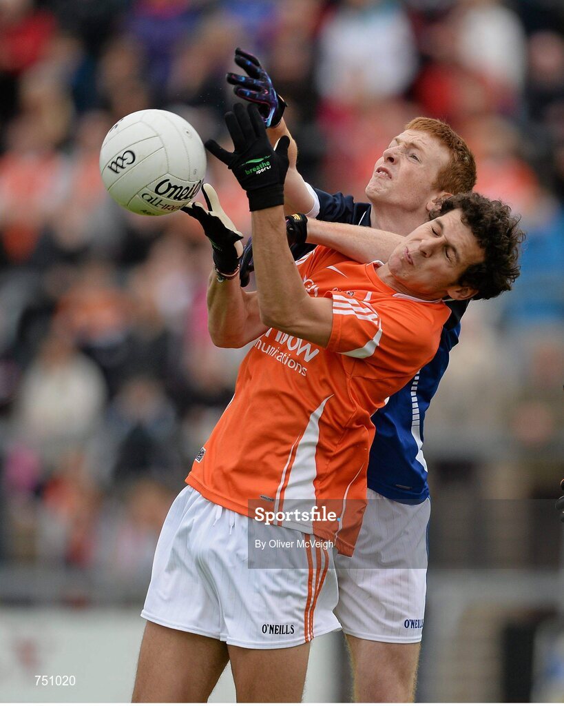 19 May 2013; Jamie Clarke, Armagh, in action against Jason McLoughlin, Cavan. Ulster GAA Football Senior Championship, Preliminary Round, Cavan v Armagh, Kingspan Breffni Park, Cavan. Picture credit: Oliver McVeigh / SPORTSFILE