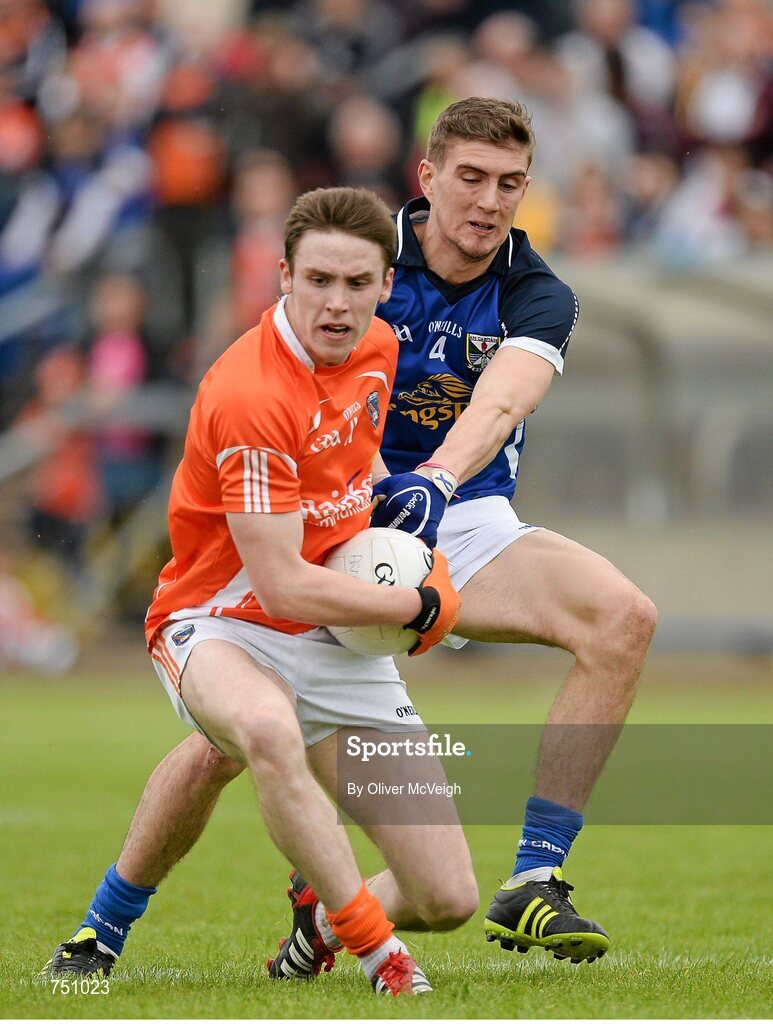 19 May 2013; Ciaran O'Hanlon, Armagh, in action against Killian Clarke, Cavan. Ulster GAA Football Senior Championship, Preliminary Round, Cavan v Armagh, Kingspan Breffni Park, Cavan. Picture credit: Oliver McVeigh / SPORTSFILE