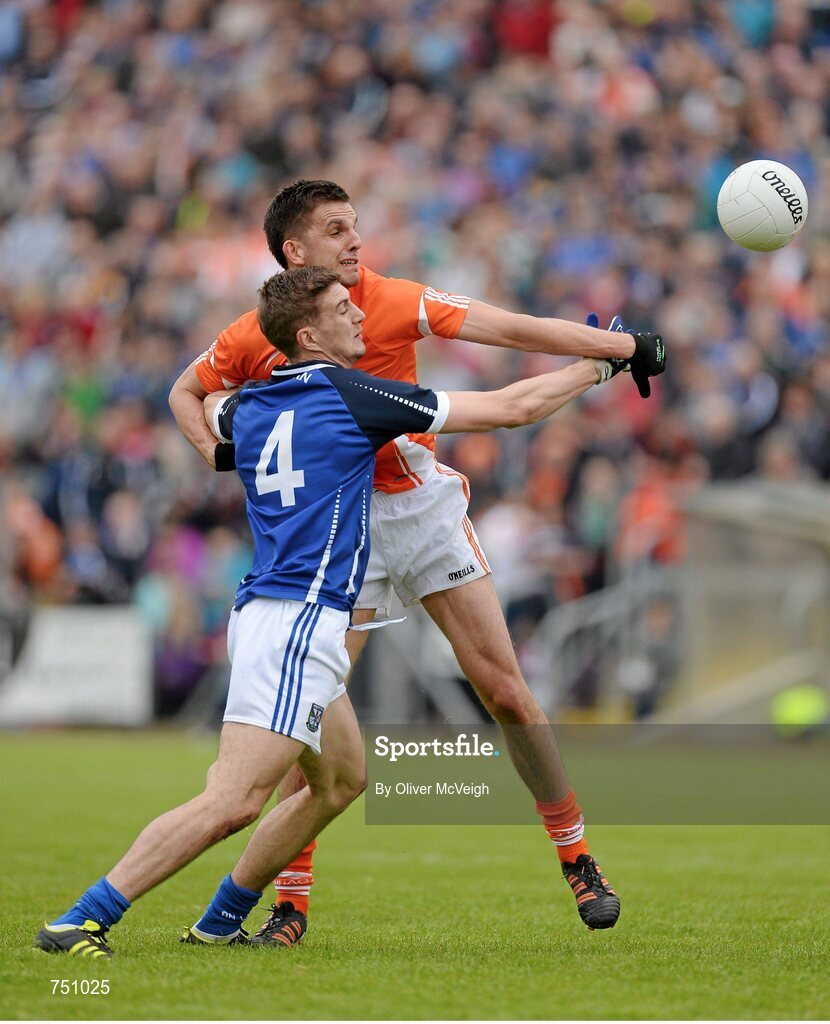 19 May 2013; Killian Clarke, Cavan, in action against Stephen Harold, Armagh. Ulster GAA Football Senior Championship, Preliminary Round, Cavan v Armagh, Kingspan Breffni Park, Cavan. Picture credit: Oliver McVeigh / SPORTSFILE