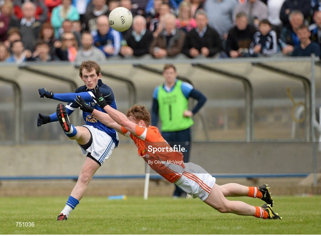 19 May 2013; Martin Dunne, Cavan, in action against Paul McKeown, Armagh. Ulster GAA Football Senior Championship, Preliminary Round, Cavan v Armagh, Kingspan Breffni Park, Cavan. Picture credit: Oliver McVeigh / SPORTSFILE