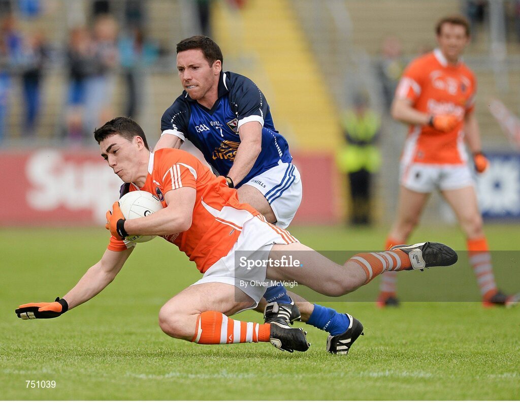 19 May 2013; Caolan Rafferty, Armagh, in action against Ronan Flanagan, Cavan. Ulster GAA Football Senior Championship, Preliminary Round, Cavan v Armagh, Kingspan Breffni Park, Cavan. Picture credit: Oliver McVeigh / SPORTSFILE