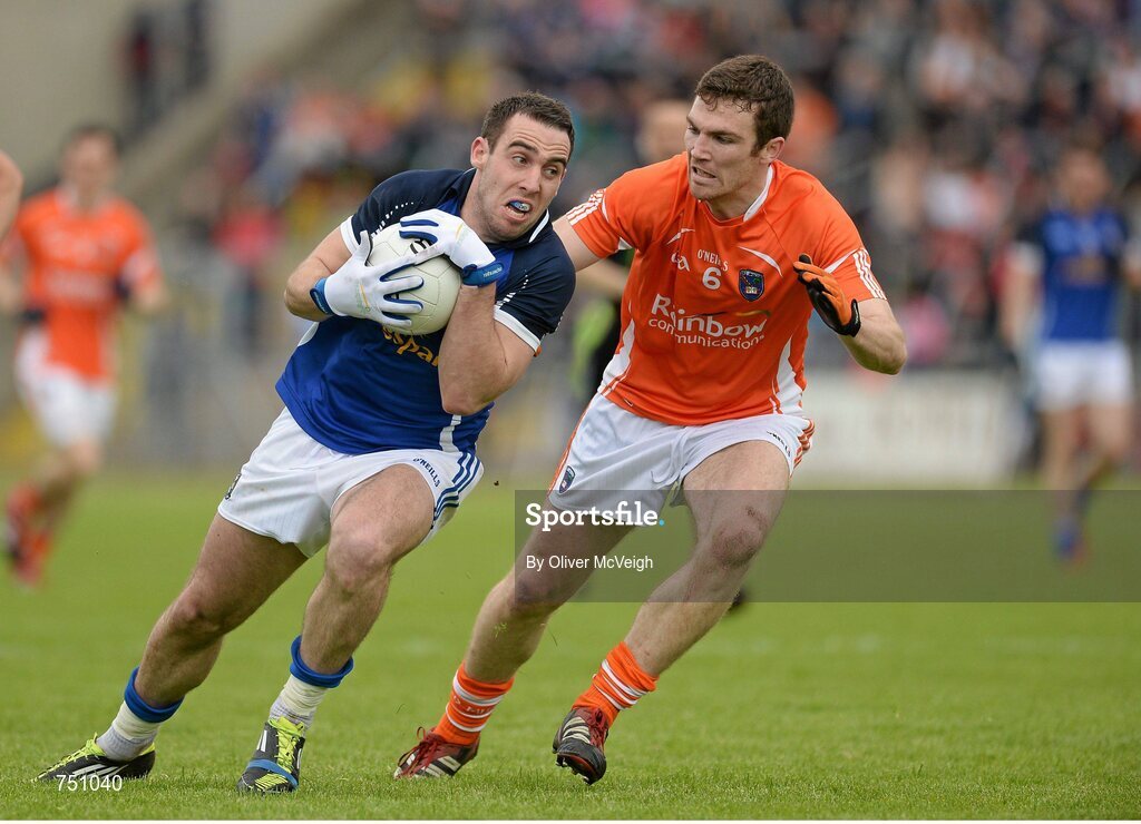 19 May 2013; Eugene Keating, Cavan, in action against Brendan Donaghy, Armagh. Ulster GAA Football Senior Championship, Preliminary Round, Cavan v Armagh, Kingspan Breffni Park, Cavan. Picture credit: Oliver McVeigh / SPORTSFILE