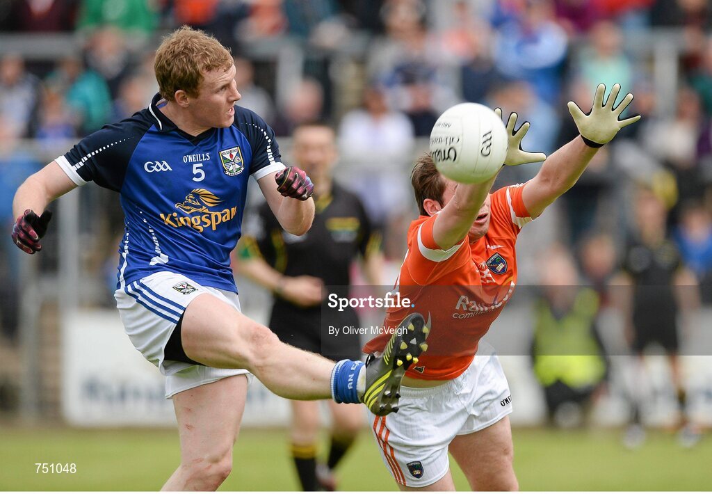 19 May 2013; James McEnroe, Cavan, in action against Johnny Hanratty, Armagh. Ulster GAA Football Senior Championship, Preliminary Round, Cavan v Armagh, Kingspan Breffni Park, Cavan. Picture credit: Oliver McVeigh / SPORTSFILE