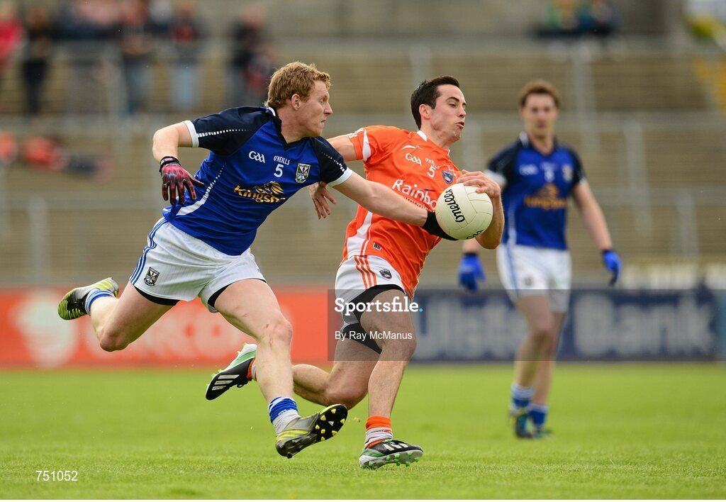 19 May 2013; James McEnroe, Cavan, in action against Aaron Kernan, Armagh. Ulster GAA Football Senior Championship, Preliminary Round, Cavan v Armagh, Kingspan Breffni Park, Cavan. Picture credit: Ray McManus / SPORTSFILE