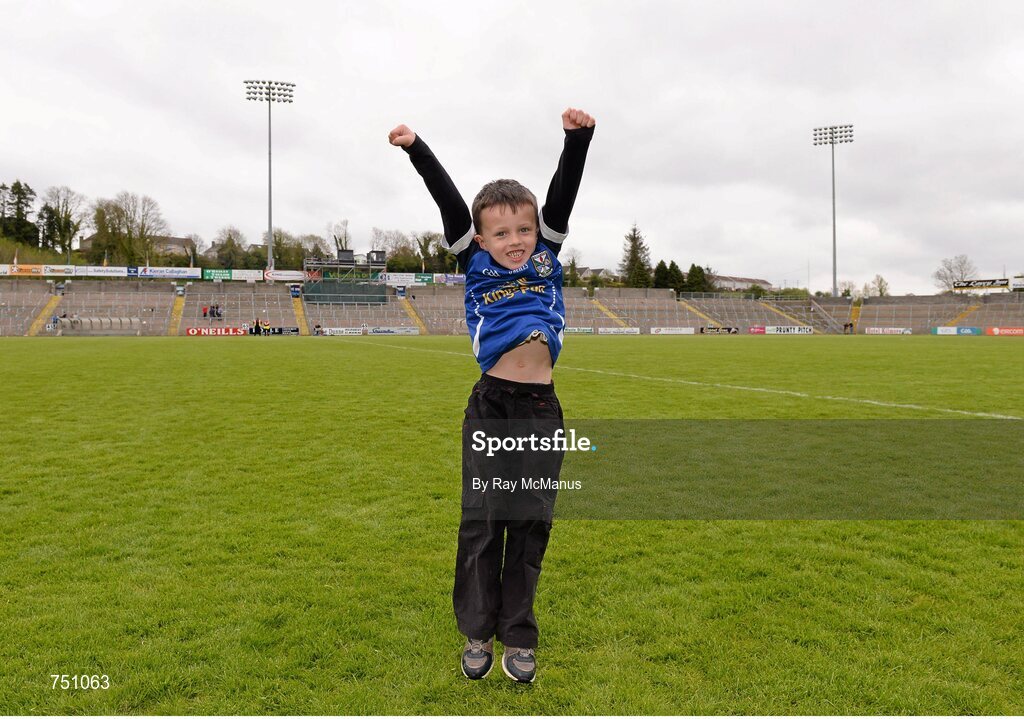 19 May 2013; Five year old James Brady, a member of the Ramor United GAA Club, Virginia, Co. Cavan, jumps with joy after the game. Ulster GAA Football Senior Championship, Preliminary Round, Cavan v Armagh, Kingspan Breffni Park, Cavan. Picture credit: Ray McManus / SPORTSFILE