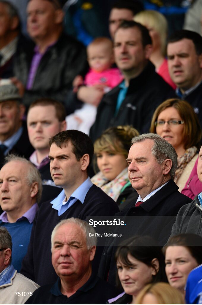 19 May 2013; Match day patrons, including Sean Quinn and his son Sean Jnr, stand for a minute silence in memory of the late GAA president Paddy Buggy. Ulster GAA Football Senior Championship, Preliminary Round, Cavan v Armagh, Kingspan Breffni Park, Cavan. Picture credit: Ray McManus / SPORTSFILE