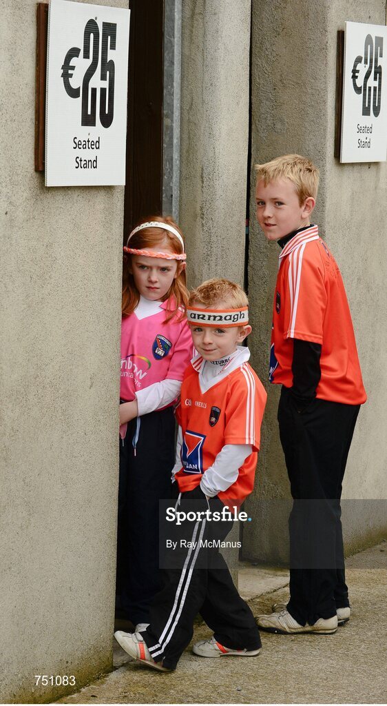 19 May 2013; Armagh supporters Niamh, six years, Kealon, 5, and Dara McGahan, 9, from Tullysaran, make their way through the turnstiles. Ulster GAA Football Senior Championship, Preliminary Round, Cavan v Armagh, Kingspan Breffni Park, Cavan. Picture credit: Ray McManus / SPORTSFILE
