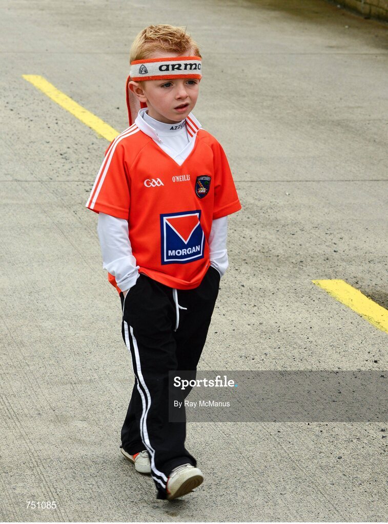 19 May 2013; Armagh supporter Kealon McGahan, aged five, from Tullysaran, makes his way to the game. Ulster GAA Football Senior Championship, Preliminary Round, Cavan v Armagh, Kingspan Breffni Park, Cavan. Picture credit: Ray McManus / SPORTSFILE
