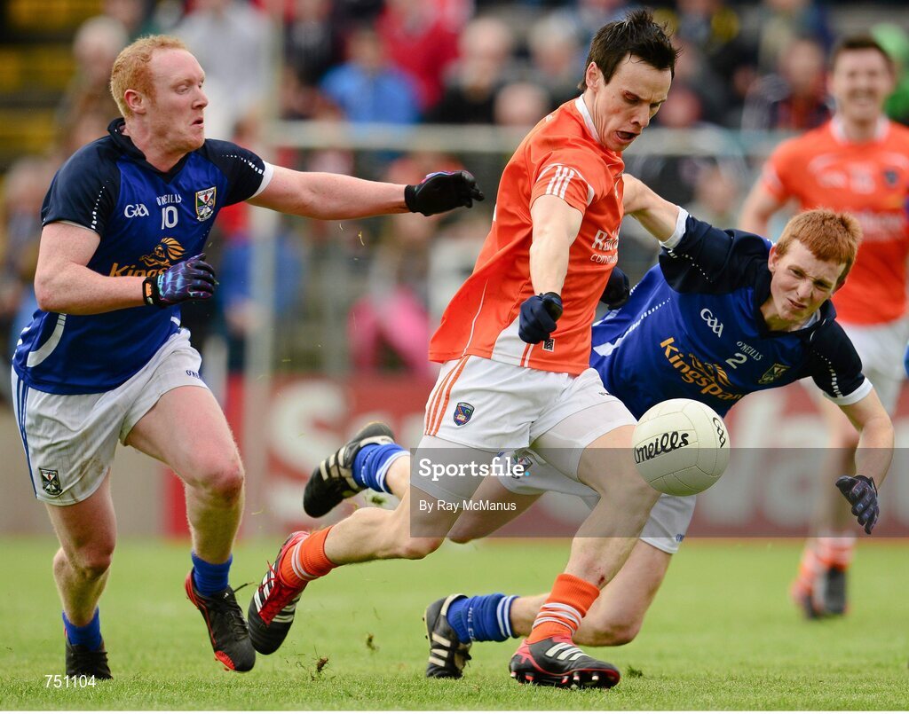 19 May 2013; Mark Shields, Armagh, in action against Cian Mackey, left, and Jason McLoughlin, Cavan. Ulster GAA Football Senior Championship, Preliminary Round, Cavan v Armagh, Kingspan Breffni Park, Cavan. Picture credit: Ray McManus / SPORTSFILE