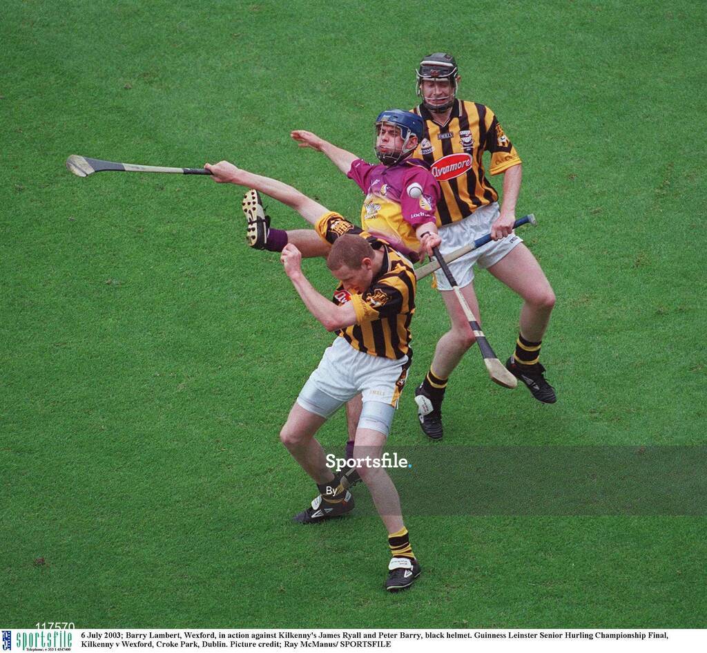 6 July 2003; Barry Lambert, Wexford, in action against Kilkenny's James Ryall and Peter Barry, black helmet. Guinness Leinster Senior Hurling Championship Final, Kilkenny v Wexford, Croke Park, Dublin. Picture credit; Ray McManus/ SPORTSFILE