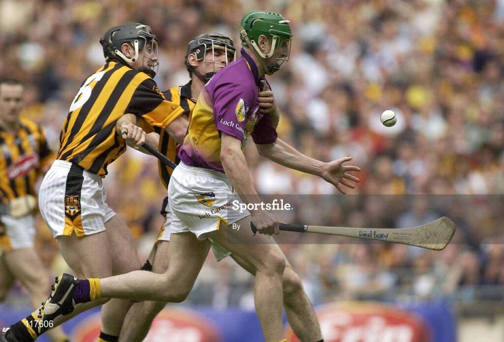 6 July 2003; Donal Berry, Wexford, in action against Kilkenny's Peter Barry and J.J. Delaney, right. Guinness Leinster Senior Hurling Championship Final, Kilkenny v Wexford, Croke Park, Dublin. Picture credit; Pat Murphy / SPORTSFILE *EDI*