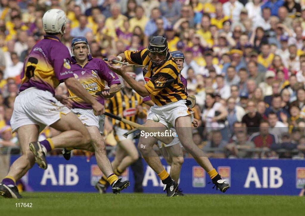 6 July 2003; Kilkenny's Eddie Brennan shoots to score his sides first goal despite the attentions of the Wexford defence. Guinness Leinster Senior Hurling Championship Final, Kilkenny v Wexford, Croke Park, Dublin. Picture credit; Pat Murphy / SPORTSFILE *EDI*