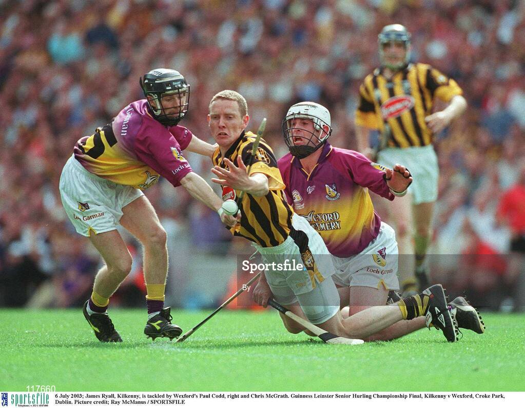 6 July 2003; James Ryall, Kilkenny, is tackled by Wexford's Paul Codd, right and Chris McGrath. Guinness Leinster Senior Hurling Championship Final, Kilkenny v Wexford, Croke Park, Dublin. Picture credit; Ray McManus / SPORTSFILE