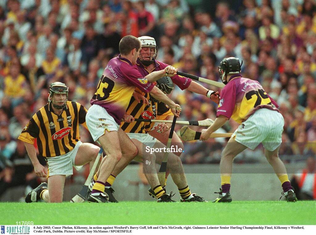 6 July 2003; Conor Phelan, Kilkenny, in action against Wexford's Barry Goff, left and Chris McGrath, right. Guinness Leinster Senior Hurling Championship Final, Kilkenny v Wexford, Croke Park, Dublin. Picture credit; Ray McManus / SPORTSFILE