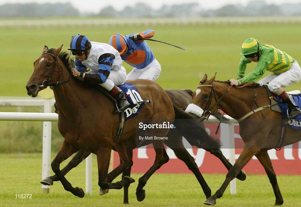 13 July 2003; Vintage Tipple, with Frankie Dettori, 10, up, wins the Darley Irish Oaks from 2nd place L'ancresse, with Sheamus Heffernan up, and 3rd place Casual Look with Martin Dwyer up, in the green and yellow silks, at the Curragh Racecourse, Co. Kildare. Picture credit; Matt Browne / SPORTSFILE *EDI*