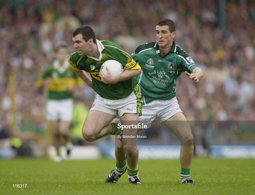 13 July 2003; Michael McCarthy, Kerry, in action against Limerick's Conor Fitzgerald. Bank of Ireland Munster Senior Football Final, Kerry v Limerick, Fitzgerald Stadium, Killarney, Co Kerry. Picture credit; Brendan Moran / SPORTSFILE *EDI*