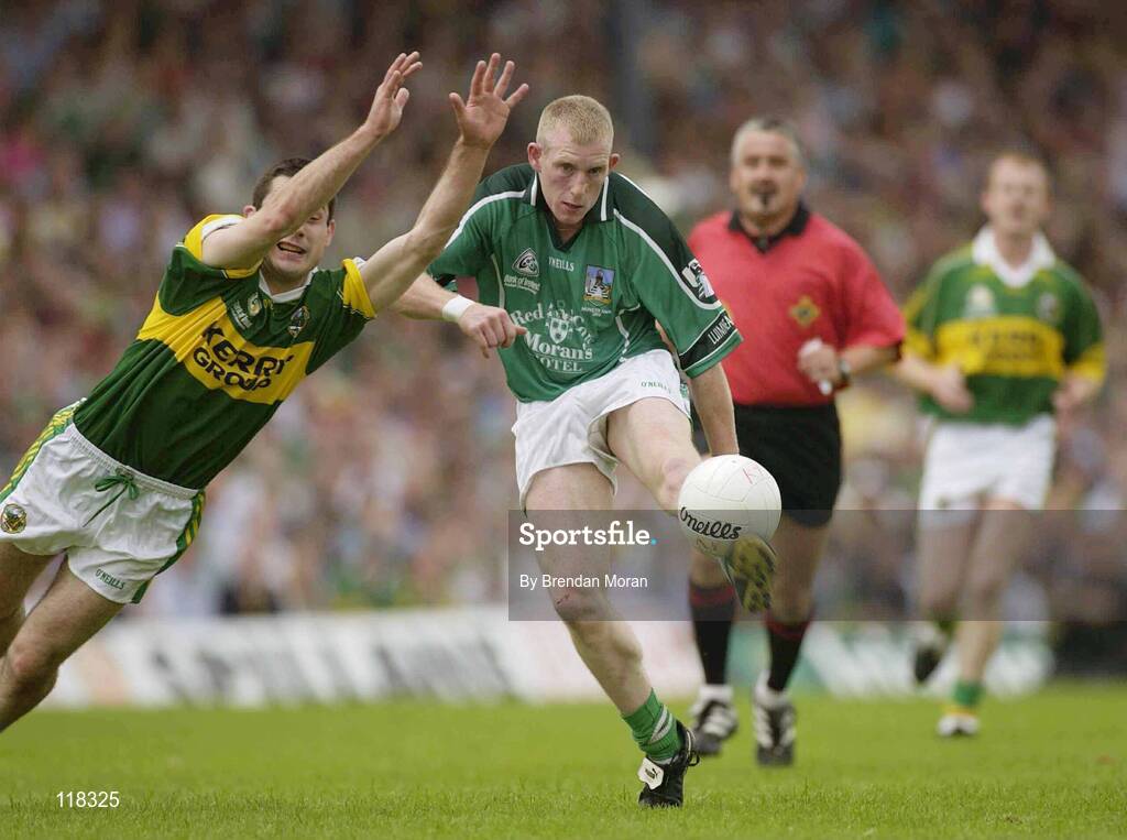 13 July 2003; Stephen Kelly, Limerick, in action against Kerry's Tom O'Sullivan. Bank of Ireland Munster Senior Football Final, Kerry v Limerick, Fitzgerald Stadium, Killarney, Co Kerry. Picture credit; Brendan Moran / SPORTSFILE *EDI*