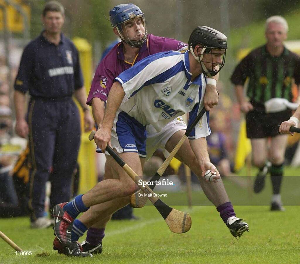 19 July 2003; James Murphy, Waterford, in action against Wexford's Barry Lambert. Guinness Senior Hurling Championship qualifier, Wexford v Waterford, Nowlan Park, Kilkenny. Picture credit; Matt Browne / SPORTSFILE *EDI*