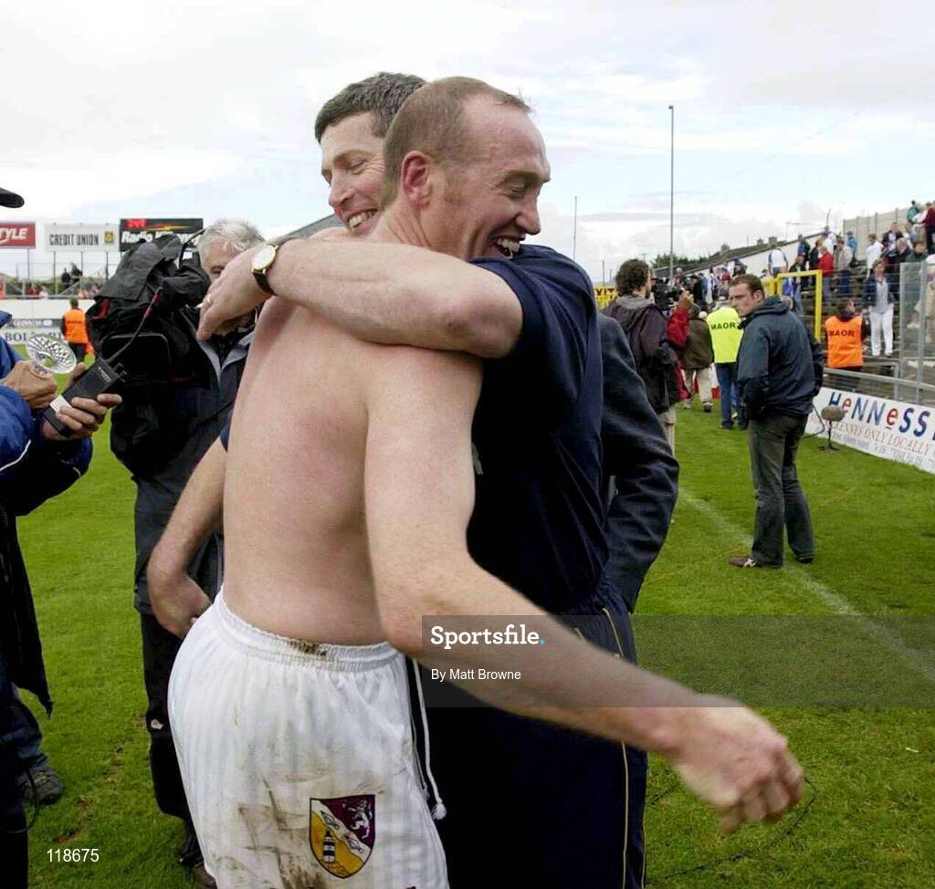 19 July 2003; Wexford man of the match Larry Murphy is congratulated by manager John Conran after the win against Waterford. Guinness Senior Hurling Championship qualifier, Wexford v Waterford, Nowlan Park, Kilkenny. Picture credit; Matt Browne / SPORTSFILE *EDI*