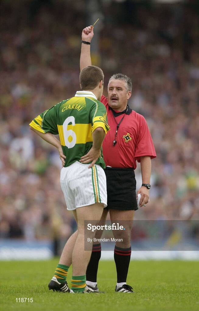 13 July 2003; Referee Brian Crowe shows a yellow card to Eamon Fitzmaurice, Kerry. Bank of Ireland Munster Senior Football Final, Kerry v Limerick, Fitzgerald Stadium, Killarney, Co Kerry. Picture credit; Brendan Moran / SPORTSFILE *EDI*