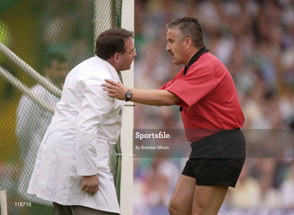 13 July 2003; Referee Brian Crowe consults one of his umpires during the game. Bank of Ireland Munster Senior Football Final, Kerry v Limerick, Fitzgerald Stadium, Killarney, Co Kerry. Picture credit; Brendan Moran / SPORTSFILE *EDI*