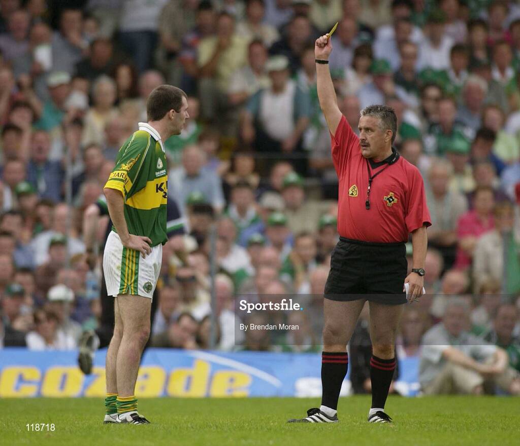 13 July 2003; Michael McCarthy, Kerry, is shown a yellow card by referee Brian Crowe. Bank of Ireland Munster Senior Football Final, Kerry v Limerick, Fitzgerald Stadium, Killarney, Co Kerry. Picture credit; Brendan Moran / SPORTSFILE *EDI*