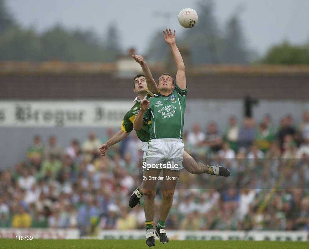 13 July 2003; Jason Stokes, Limerick, in action against Kerry's Tom O'Sullivan. Bank of Ireland Munster Senior Football Final, Kerry v Limerick, Fitzgerald Stadium, Killarney, Co Kerry. Picture credit; Brendan Moran / SPORTSFILE *EDI*