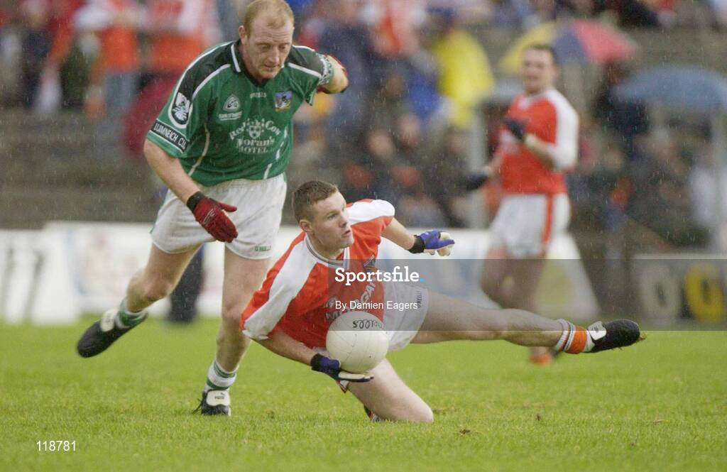 20 July 2003; Armagh's Philip Loughran in action against Limerick's John Quaine. Bank of Ireland Senior Football Championship qualifier, Limerick v Armagh, Dr Hyde Park, Roscommon. Picture credit; Damien Eagers / SPORTSFILE *EDI*
