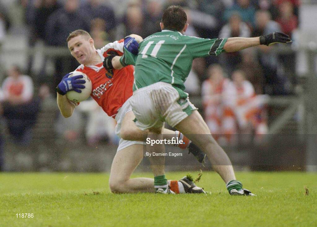 20 July 2003; Armagh's John Toal in action against Limerick's Muiris Gavin. Bank of Ireland Senior Football Championship qualifier, Limerick v Armagh, Dr Hyde Park, Roscommon. Picture credit; Damien Eagers / SPORTSFILE *EDI*