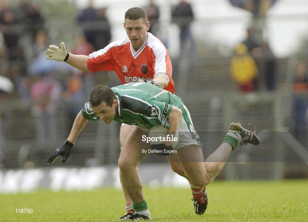 20 July 2003; Muiris Gavin, Limerick, in action against Armagh's Diarmaid Marsden. Bank of Ireland Senior Football Championship qualifier, Limerick v Armagh, Dr Hyde Park, Roscommon. Picture credit; Damien Eagers / SPORTSFILE *EDI*