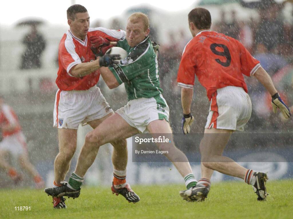 20 July 2003; John Quaine, Limerick, in action against Armagh's Diarmaid Marsden and Paul McGrane, 9. Bank of Ireland Senior Football Championship qualifier, Limerick v Armagh, Dr Hyde Park, Roscommon. Picture credit; Damien Eagers / SPORTSFILE *EDI*