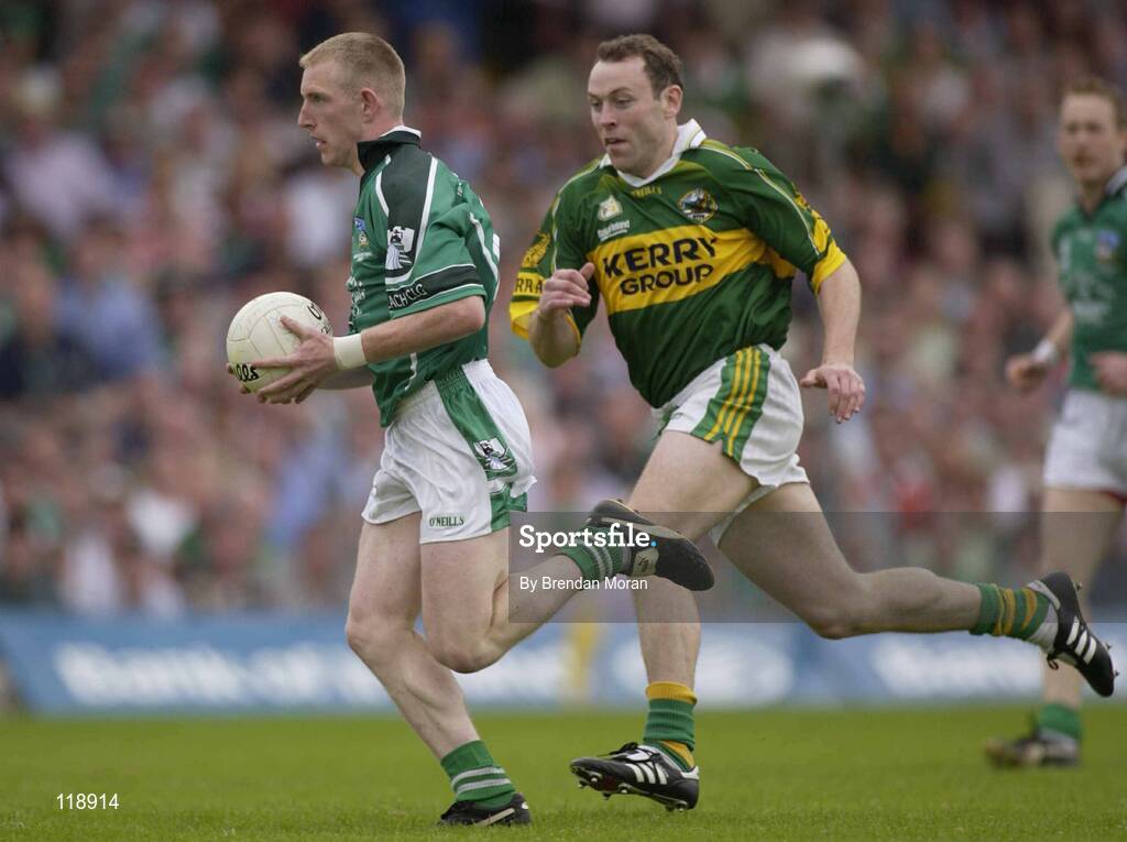 13 July 2003; Stephen Kelly, Limerick, in action against Kerry's Seamus Moynihan. Bank of Ireland Munster Senior Football Final, Kerry v Limerick, Fitzgerald Stadium, Killarney, Co Kerry. Picture credit; Brendan Moran / SPORTSFILE *EDI*