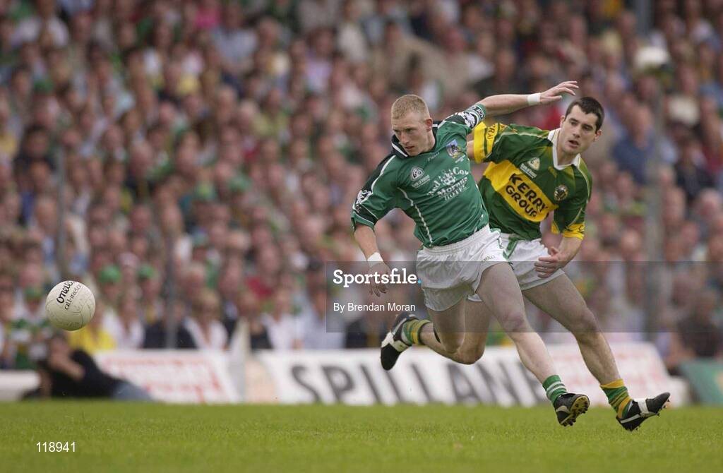 13 July 2003; Stephen Kelly, Limerick, in action against Kerry's Tom O'Sullivan. Bank of Ireland Munster Senior Football Final, Kerry v Limerick, Fitzgerald Stadium, Killarney, Co Kerry. Picture credit; Brendan Moran / SPORTSFILE *EDI*