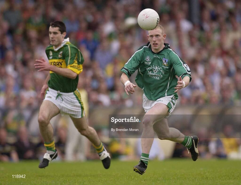 13 July 2003; Stephen Kelly, Limerick, in action against Kerry's Tom O'Sullivan. Bank of Ireland Munster Senior Football Final, Kerry v Limerick, Fitzgerald Stadium, Killarney, Co Kerry. Picture credit; Brendan Moran / SPORTSFILE *EDI*