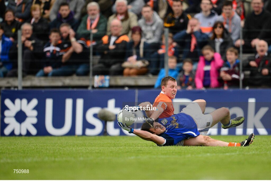 19 May 2013; Eugene Keating, Cavan, is tackled by Declan McKenna, Armagh. Ulster GAA Football Senior Championship, Preliminary Round, Cavan v Armagh, Kingspan Breffni Park, Cavan. Picture credit: Ray McManus / SPORTSFILE
