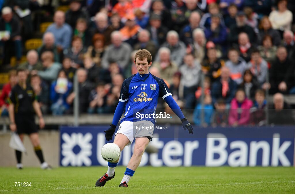 19 May 2013; Martin Dunne kicks a free for Cavan. Ulster GAA Football Senior Championship, Preliminary Round, Cavan v Armagh, Kingspan Breffni Park, Cavan. Picture credit: Ray McManus / SPORTSFILE