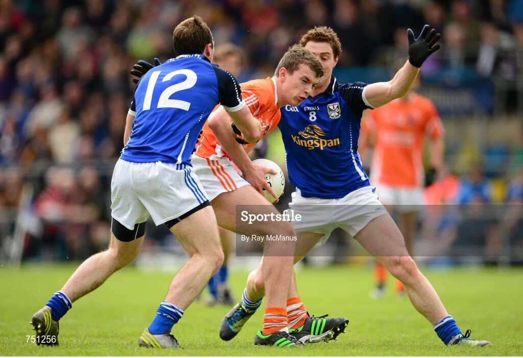 19 May 2013; Ethan Rafferty, Armagh, in action against Fergal Flanagan, left, and Damien O'Reilly, Cavan. Ulster GAA Football Senior Championship, Preliminary Round, Cavan v Armagh, Kingspan Breffni Park, Cavan. Picture credit: Ray McManus / SPORTSFILE