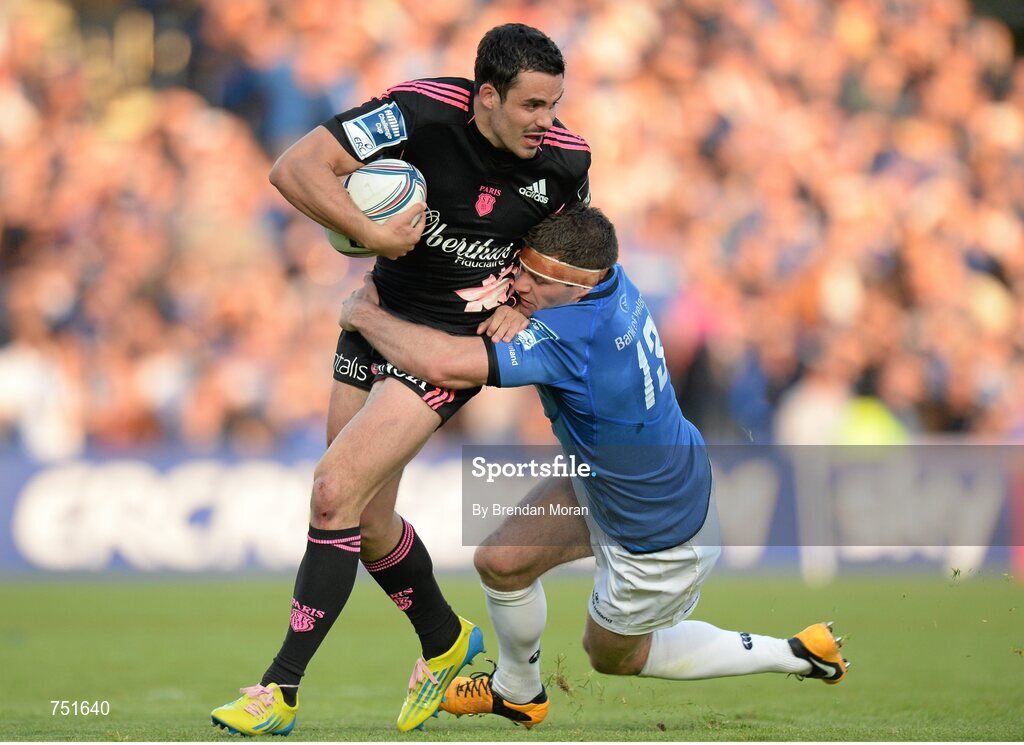 17 May 2013; Geoffrey Doumayrou, Stade Francais, is tackled by Fergus McFadden, Leinster. Amlin Challenge Cup Final 2012/13, Leinster v Stade Francais, RDS, Ballsbridge, Dublin. Picture credit: Brendan Moran / SPORTSFILE