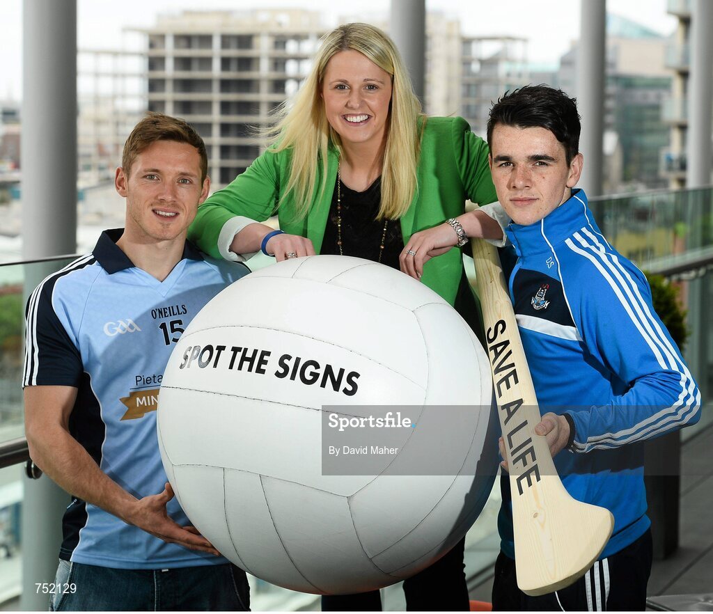 22 May 2013; Dublin footballer Paul Flynn, left, and hurler Danny Sutcliffe with RTE's Jacqui Hurley in attendance at the launch of the jersey initiative and Pieta House ‘MIND OUR MEN’ campaign into Dublin GAA. The Gibson Hotel, Dublin. Picture credit: David Maher / SPORTSFILE