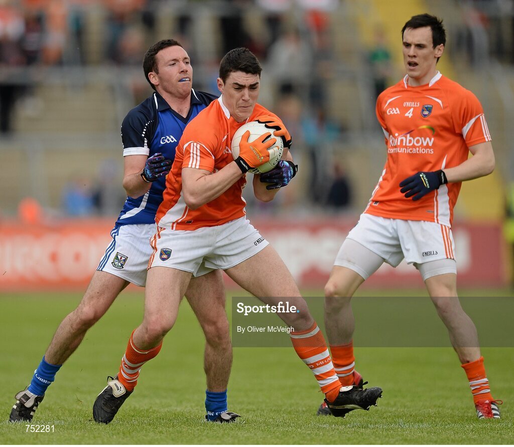 19 May 2013; Caolan Rafferty, Armagh, in action against Ronan Flanagan, Cavan. Ulster GAA Football Senior Championship, Preliminary Round, Cavan v Armagh, Kingspan Breffni Park, Cavan. Picture credit: Oliver McVeigh / SPORTSFILE