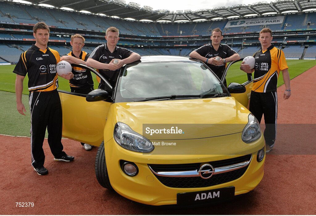 23 May 2013; From left, Cork footballer Eoin Cadogan, Kerry footballer Colm Cooper, Galway hurlier Joe Canning, Kilkenny hurler Jackie Tyrrell and Dublin footballer Ciaran Kilkenny, with the Opel ADAM, pictured at the launch of Opel Kits for Clubs 2013 – For every test drive, car service or Opel purchase made through the Opel dealer network, your local GAA club is awarded points. Build up your points and redeem them against high quality kit for your club! Log onto opelkitforclubs.com and start earning points today. Support your local GAA club! Croke Park, Dublin. Picture credit: Matt Browne / SPORTSFILE