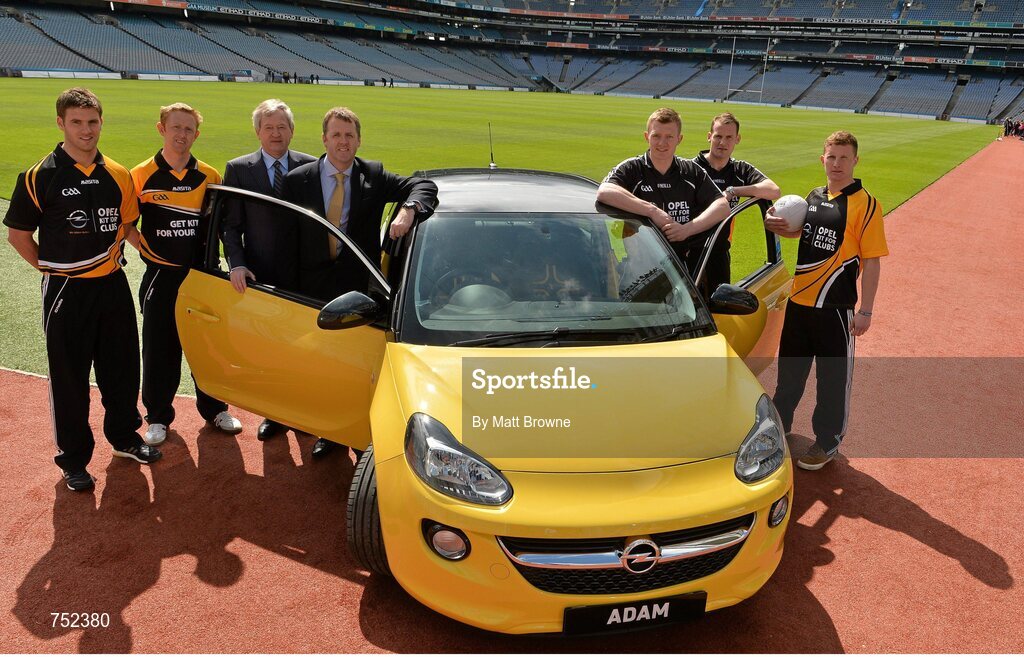 23 May 2013; From left, Cork footballer Eoin Cadogan, Kerry footballer Colm Cooper,  Páraic Duffy, Ard Stiúrthóir of the GAA, Dave Sheeran, Managung Director of Opel Ireland, Galway hurlier Joe Canning, Kilkenny hurler Jackie Tyrrell and Dublin footballer Ciaran Kilkenny, with the Opel ADAM, pictured at the launch of Opel Kits for Clubs 2013 – For every test drive, car service or Opel purchase made through the Opel dealer network, your local GAA club is awarded points. Build up your points and redeem them against high quality kit for your club! Log onto opelkitforclubs.com and start earning points today. Support your local GAA club! Croke Park, Dublin. Picture credit: Matt Browne / SPORTSFILE