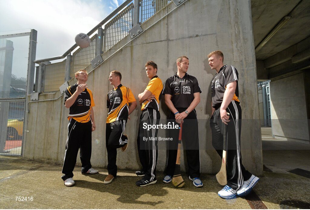 23 May 2013; From left, Kerry footballer Colm Cooper, Dublin footballer Ciaran Kilkenny, Cork footballer Eoin Cadogan, Kilkenny hurler Jackie Tyrrell and Galway hurler Joe Canning pictured at the launch of Opel Kits for Clubs 2013 – For every test drive, car service or Opel purchase made through the Opel dealer network, your local GAA club is awarded points. Build up your points and redeem them against high quality kit for your club! Log onto opelkitforclubs.com and start earning points today. Support your local GAA club! Croke Park, Dublin. Picture credit: Matt Browne / SPORTSFILE