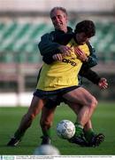 9 November 1996;  Republic of Ireland manager Mick McCarthy tackles Roy Keane during a squad training session at Lansdowne Road.  Soccer. Picture credit; Ray McManus/SPORTSFILE