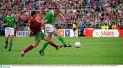 2 June 2001; Ireland's Roy Keane shoots to score his side's first goal past Portugal's Arnando Teixeira. World Cup Qualifier, Republic of Ireland v Portugal, Lansdowne Road, Dublin. Picture credit; Aoife Rice / SPORTSFILE